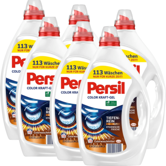 Five Persil Color Kraft-Gel laundry detergent bottles with red caps clustered together.