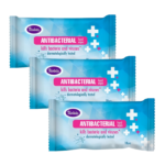 Three blue Violeta antibacterial hand wipe sachets stacked together, labeled 'Antibacterial hand wipes' that kill bacteria and viruses and are dermatologically tested (18 pieces per pack). l